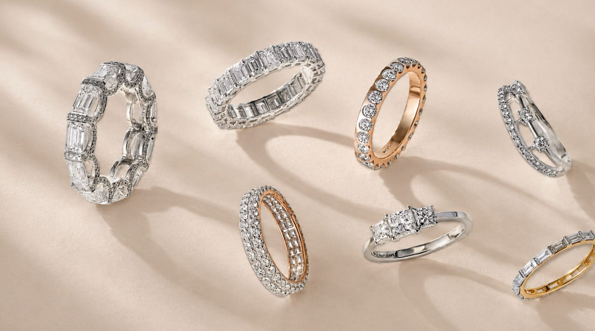 Collection of lab grown diamond eternity and engagement rings in gold and platinum