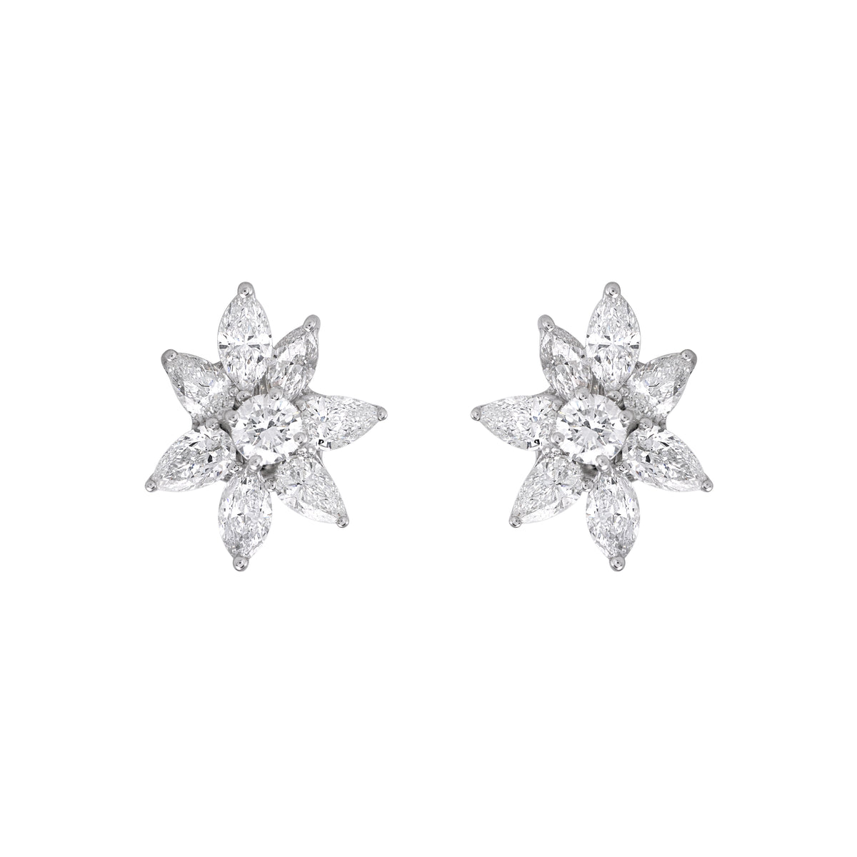 Floral cluster diamond earrings by EVERLUME JEWELS featuring pear-shaped diamonds