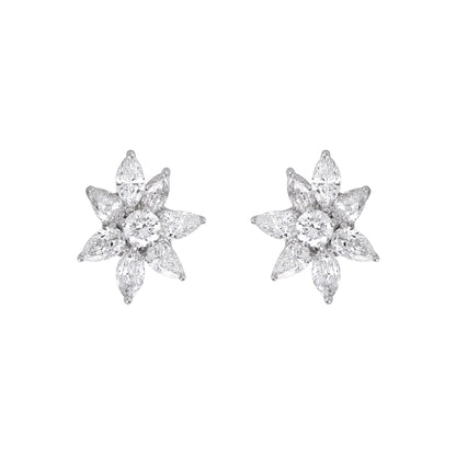 Floral cluster diamond earrings by EVERLUME JEWELS featuring pear-shaped diamonds