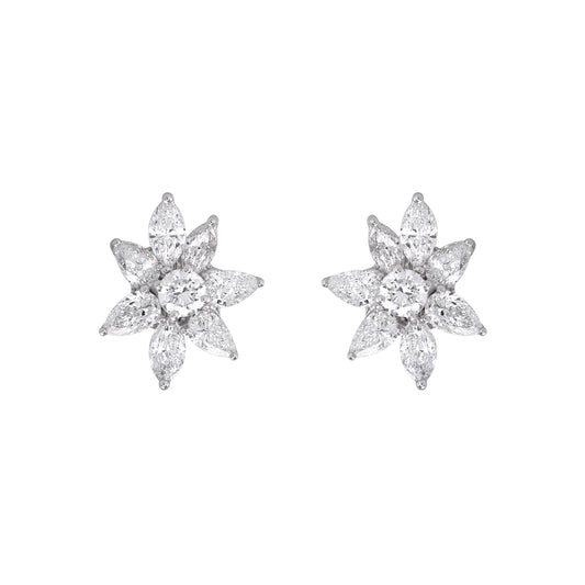 Floral cluster diamond earrings by EVERLUME JEWELS featuring pear-shaped diamonds