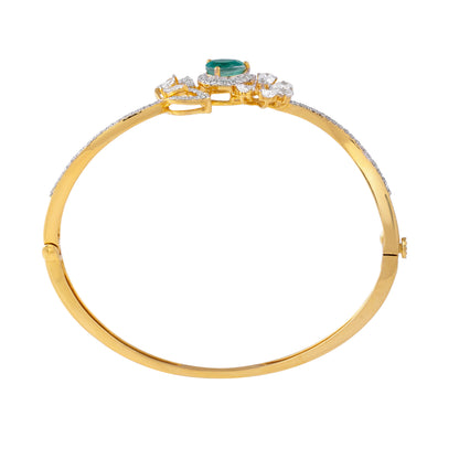 Everlume Jewels gold bangle with a pear-shaped emerald and lab grown diamonds